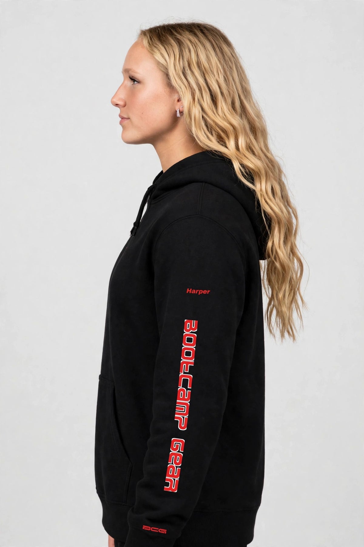 Harper wearing the Hangry Harper Shakopee Hoodie – Black, right sleeve view