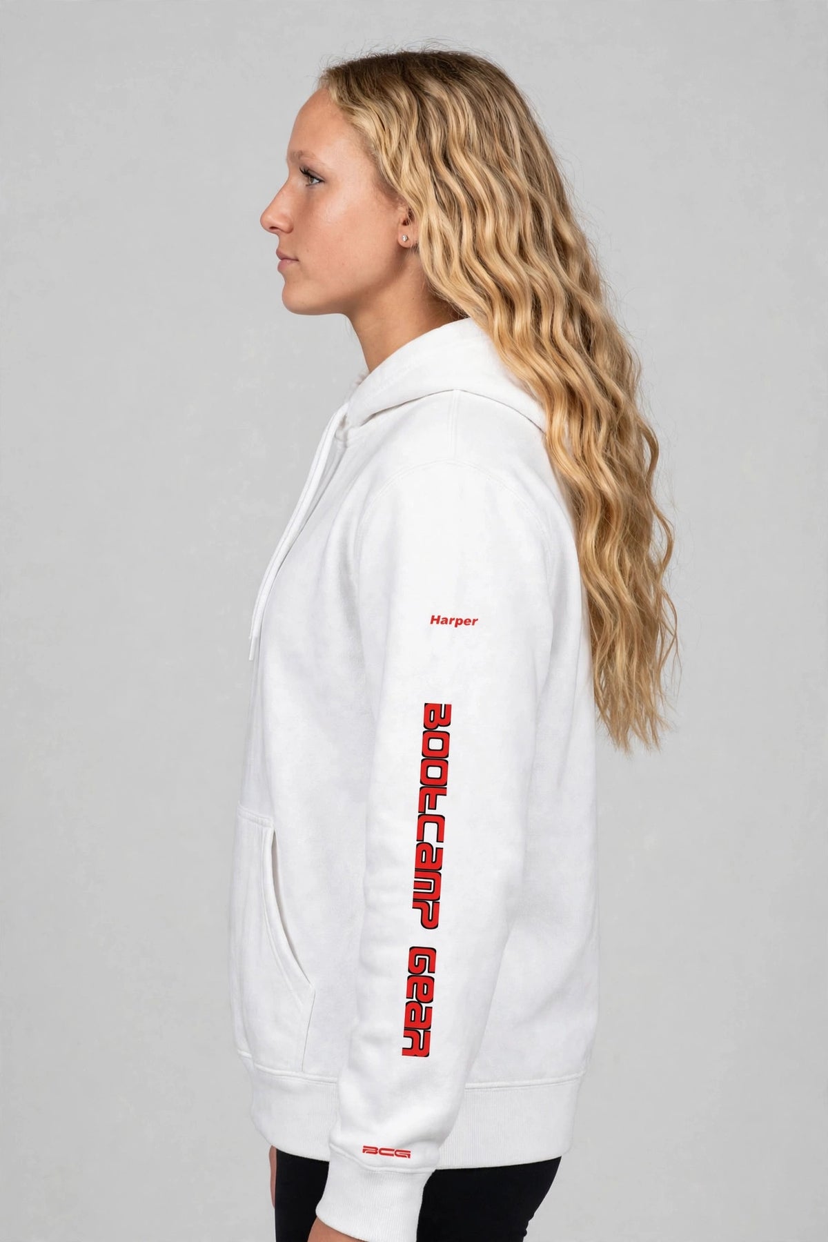 Harper wearing the Hangry Harper Shakopee Hoodie – White, right sleeve view