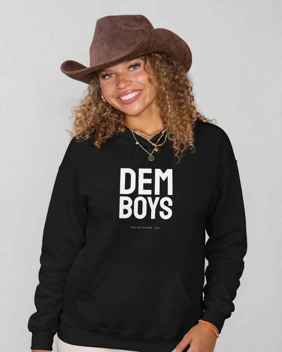 Amara wearing the DEM BOYS Hoodie – Staatliches (Black), front view