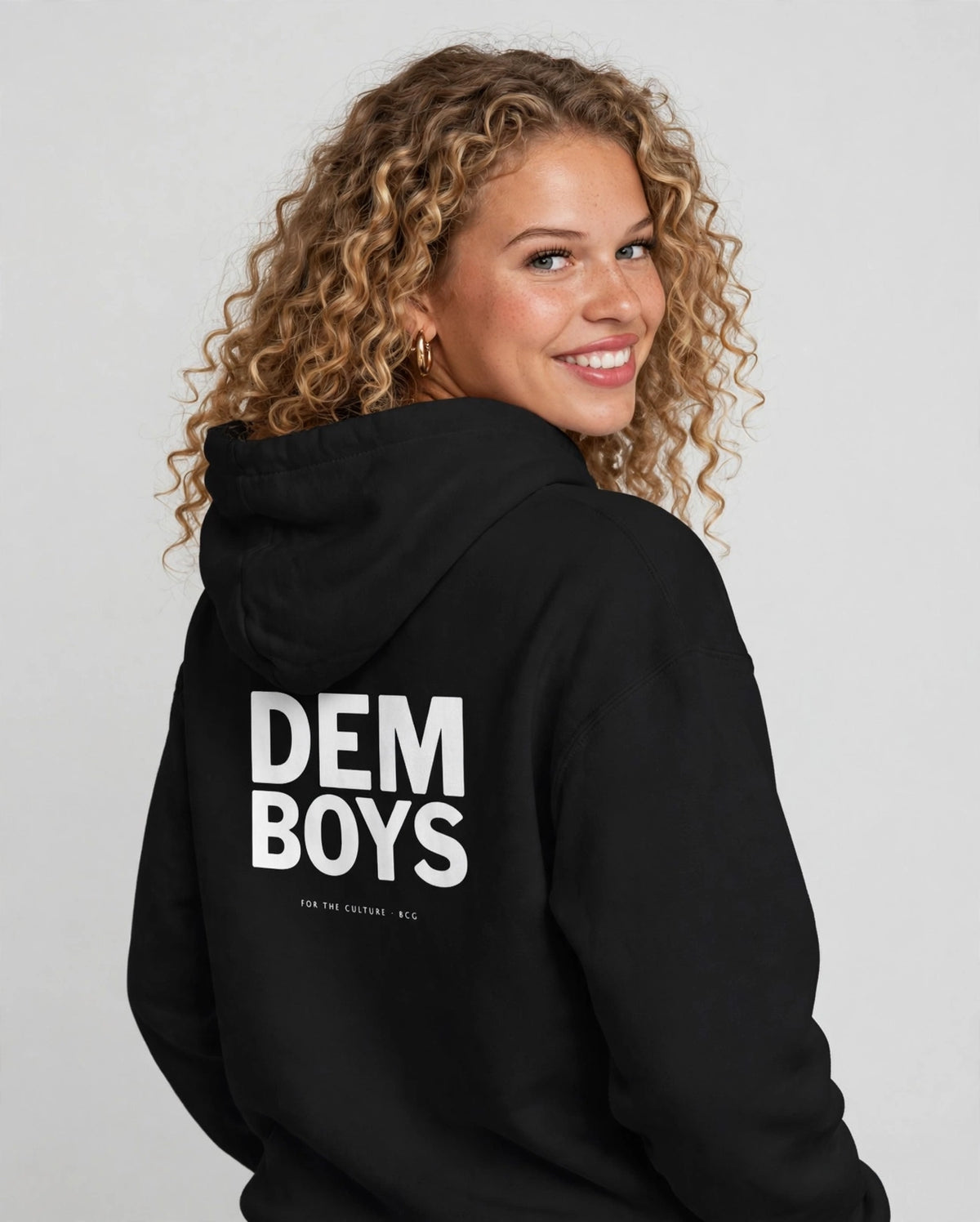 Amara wearing the DEM BOYS Hoodie – Franklin (Black), back view