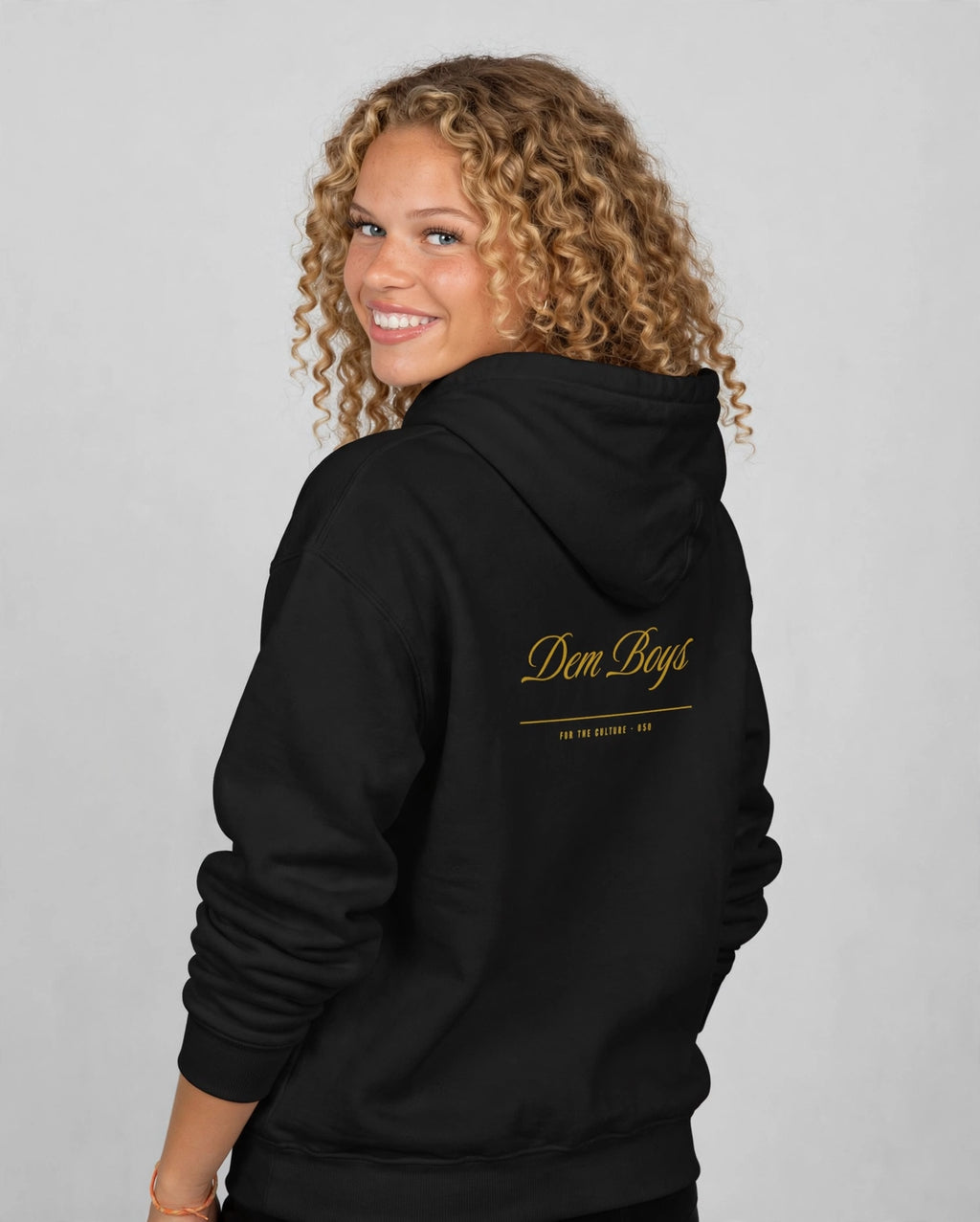Amara wearing the DEM BOYS Hoodie – Luxurious (Black), back view