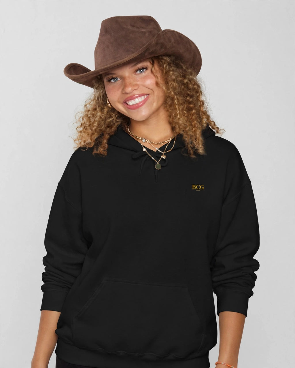 Amara wearing the Grateful Hoodie – Italiana (Black), front view