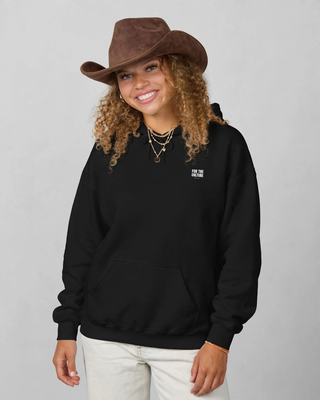 Amara wearing the The Lesson Hoodie – New Rocker (Black), front view