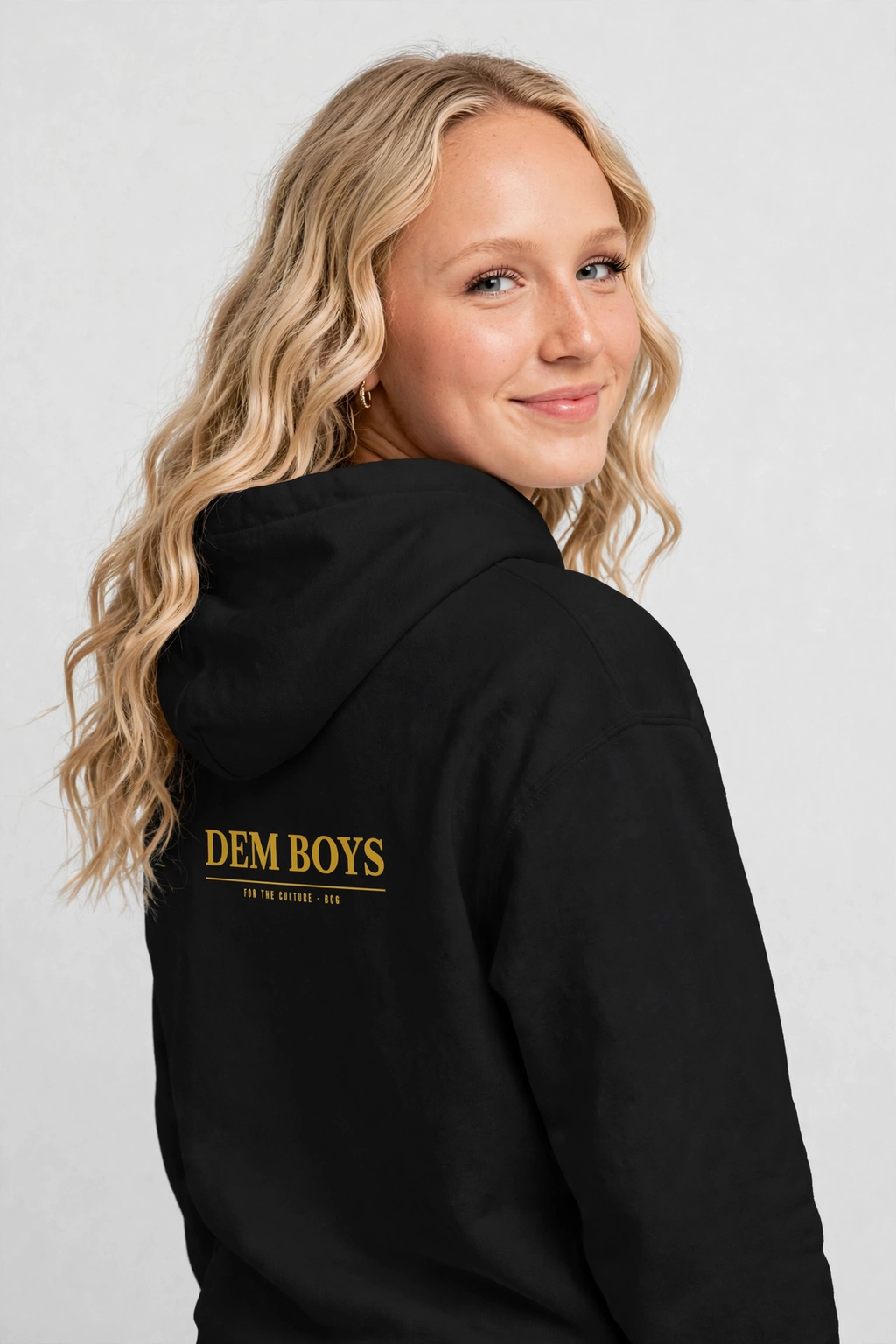 Harper wearing the DEM BOYS Hoodie – Caslon (Black), back view