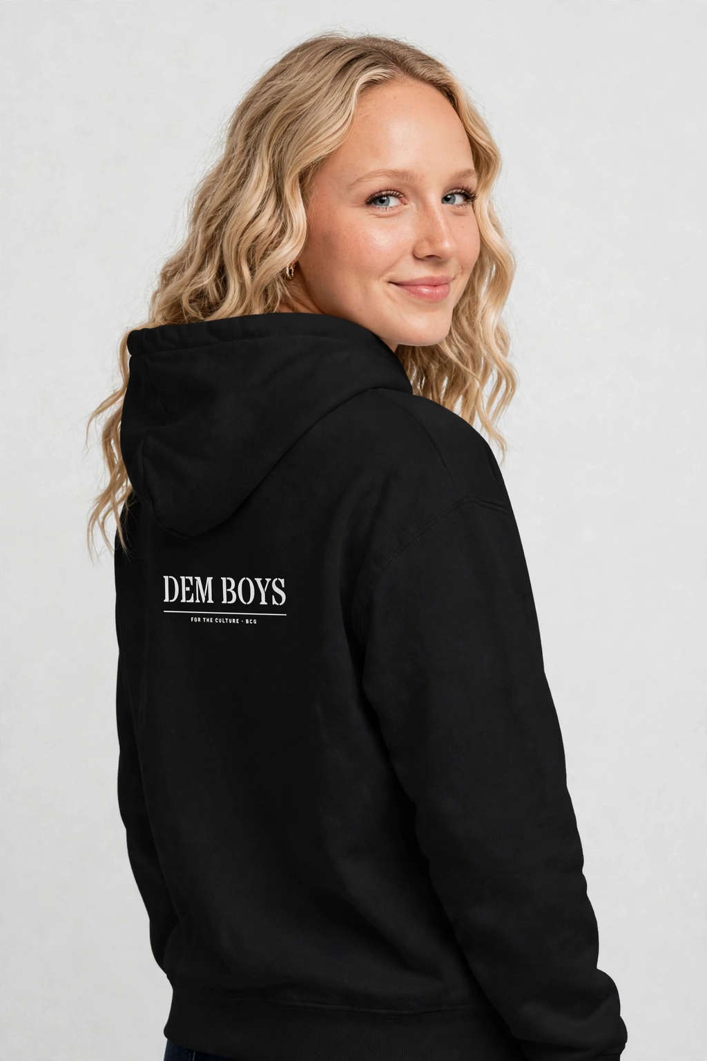 Harper wearing the DEM BOYS Hoodie – Stencil (Black), back view