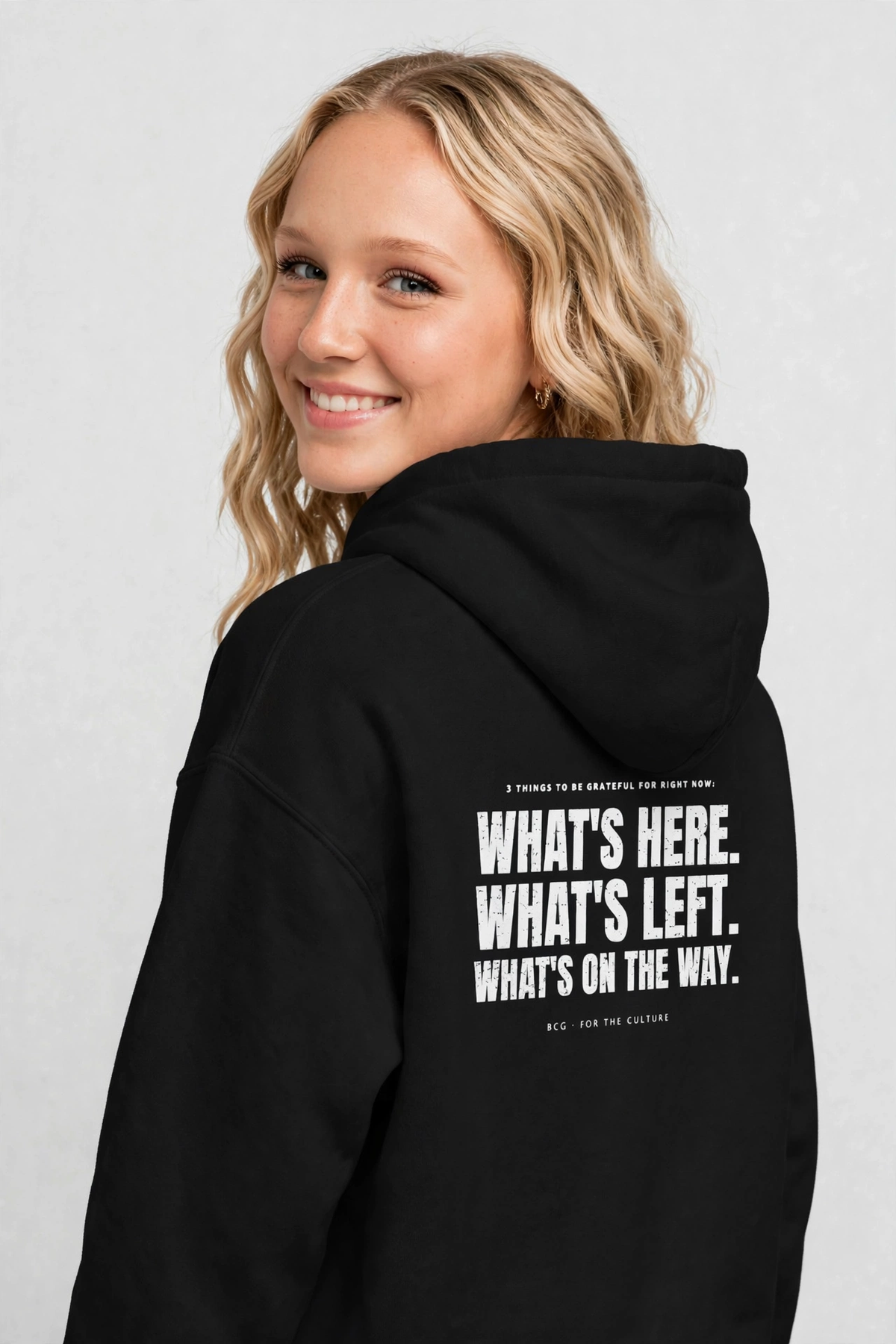 Harper wearing the Grateful Hoodie – Grunge (Black), back view
