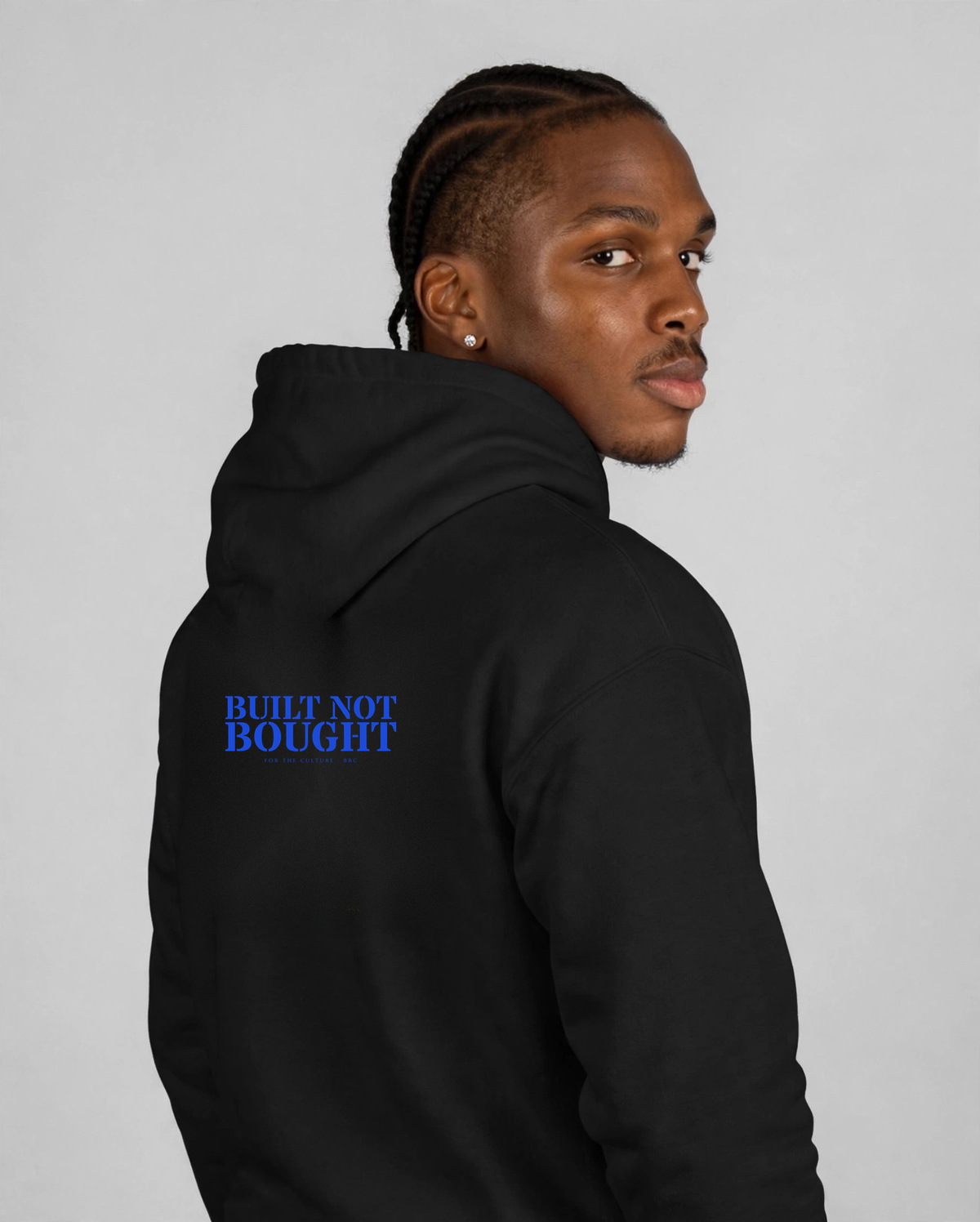 Patrick wearing the BBC Ball-Seam Hoodie – Black, back view