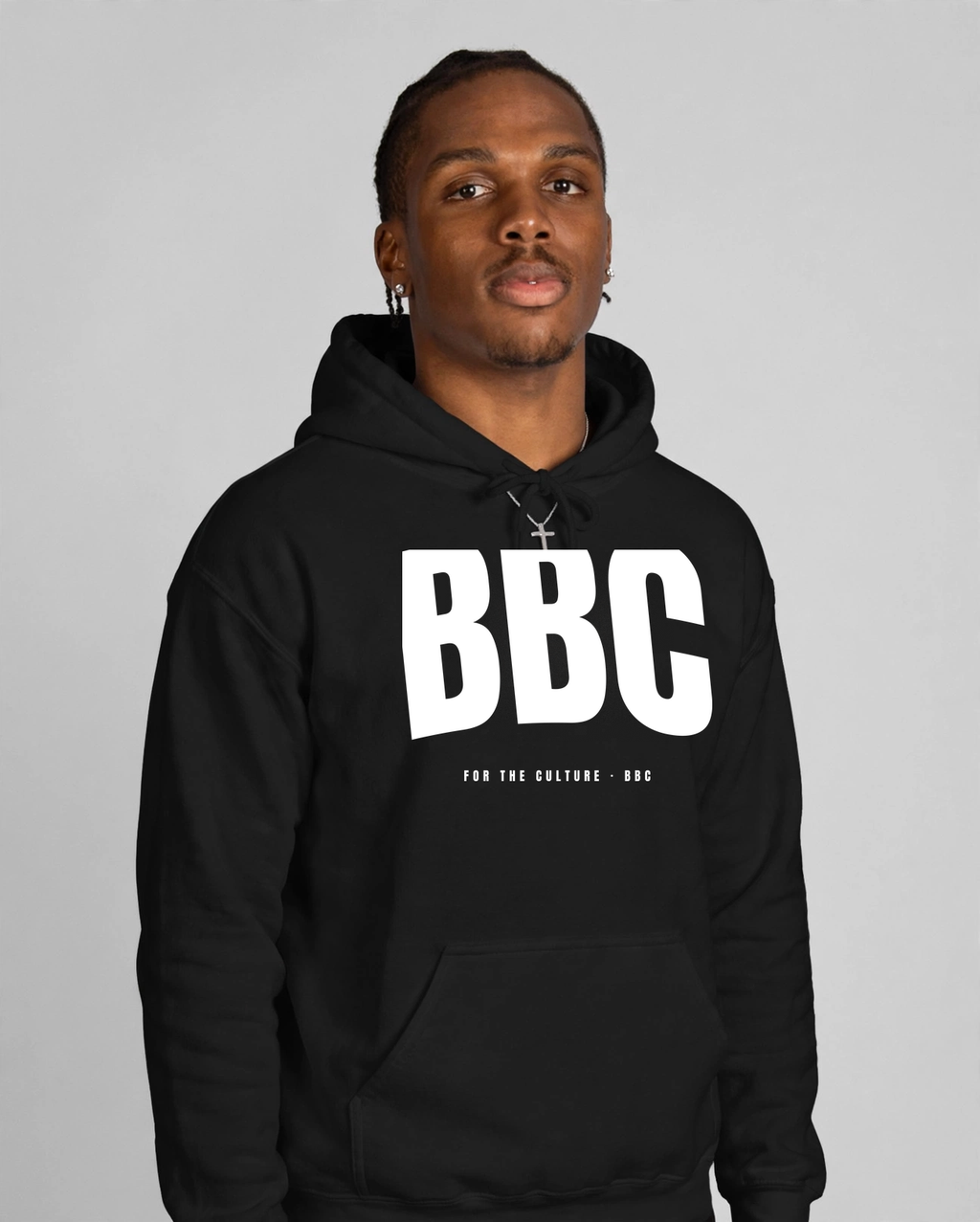 Patrick wearing the BBC Stadium Arch Hoodie – Black, front view