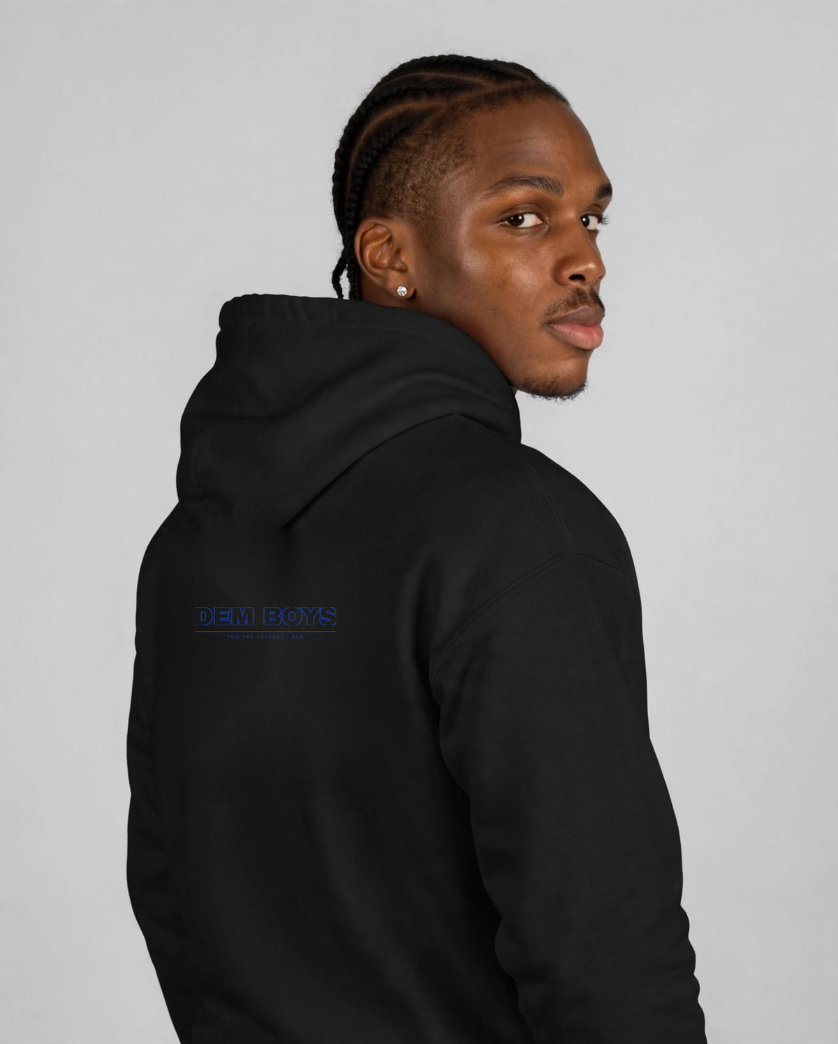 Patrick wearing the DEM BOYS Hoodie – Varsity (Black), back view