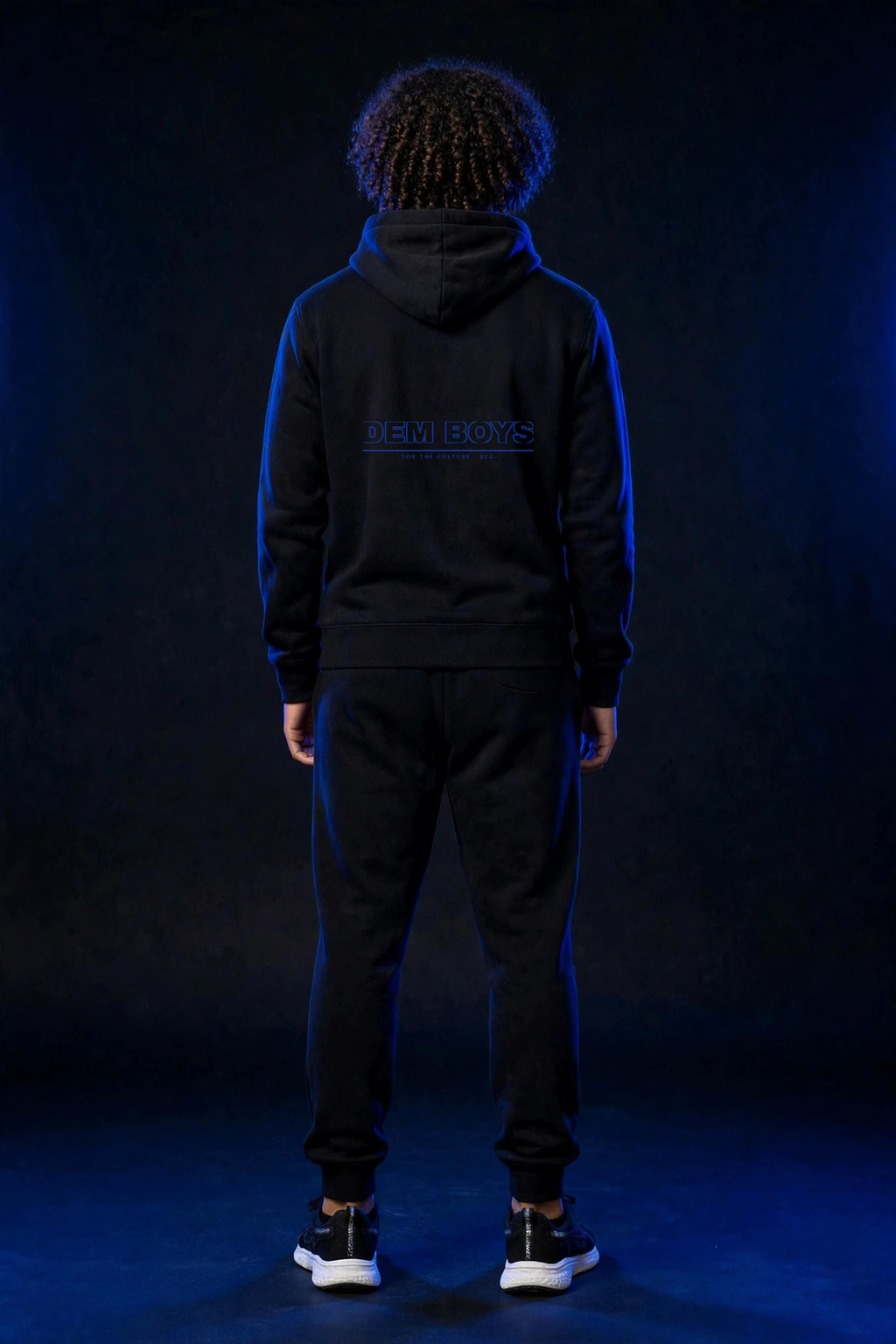 Michael wearing the DEM BOYS Hoodie – Varsity (Black) (back)