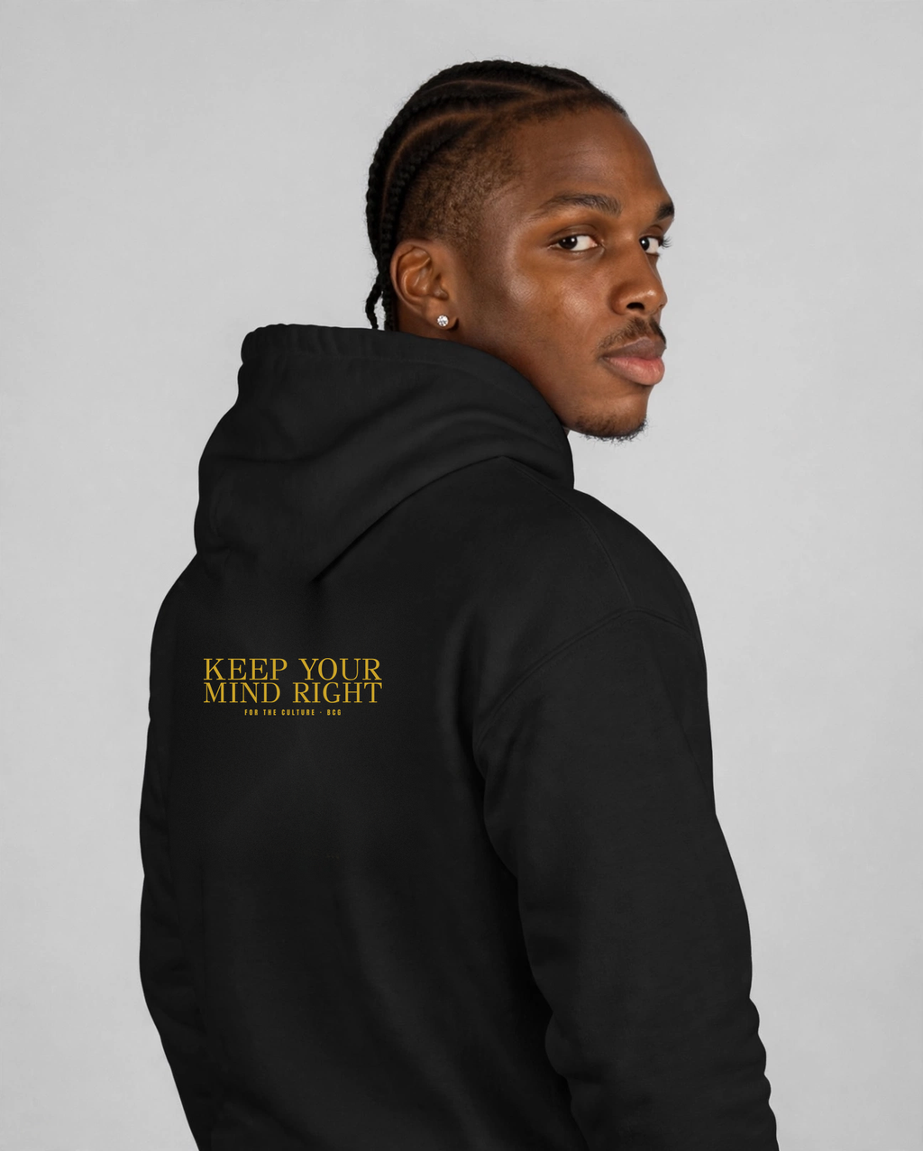 Patrick wearing the Keep Your Mind Right Hoodie – Didot (Black), back view