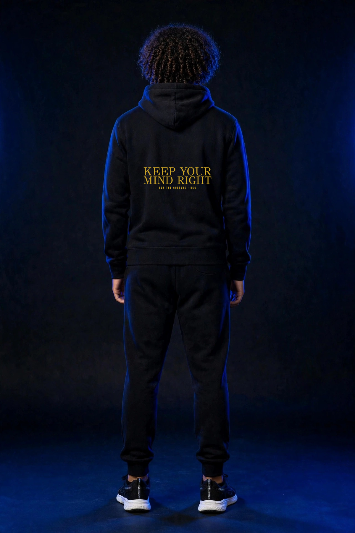 Michael wearing the Keep Your Mind Right Hoodie – Didot (Black) (back)