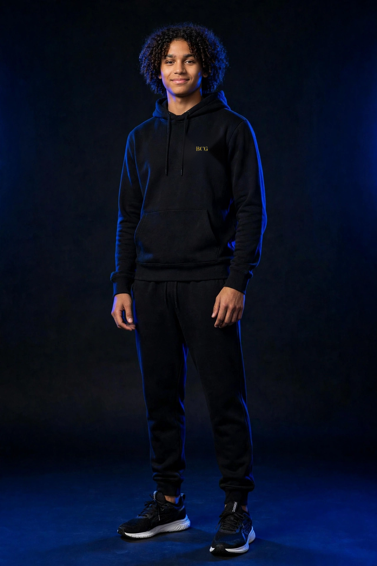 Michael wearing the Keep Your Mind Right Hoodie – Didot (Black), front view