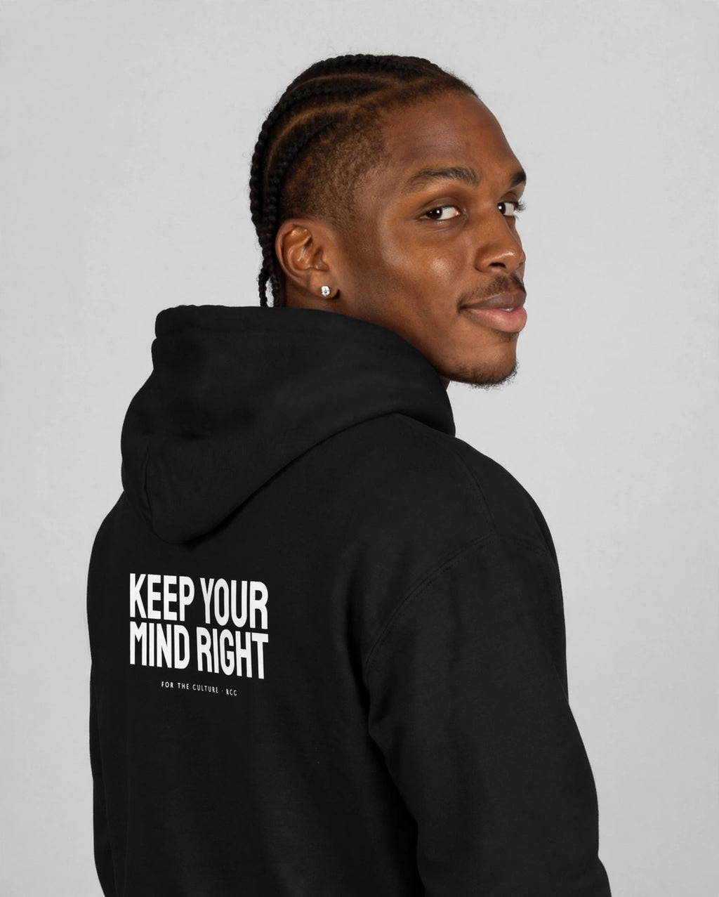Patrick wearing the Keep Your Mind Right Hoodie – Staatliches (Black), back view