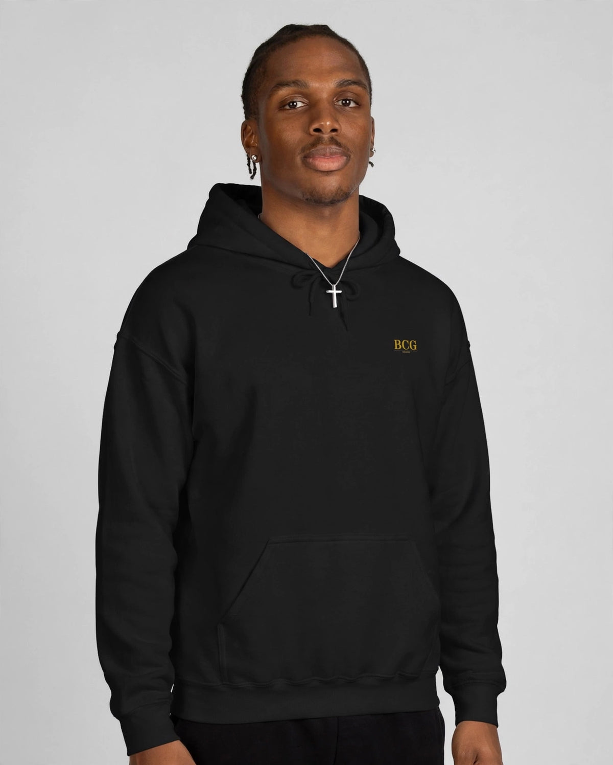 Patrick wearing the Family First Hoodie – Cinzel (Black), front view