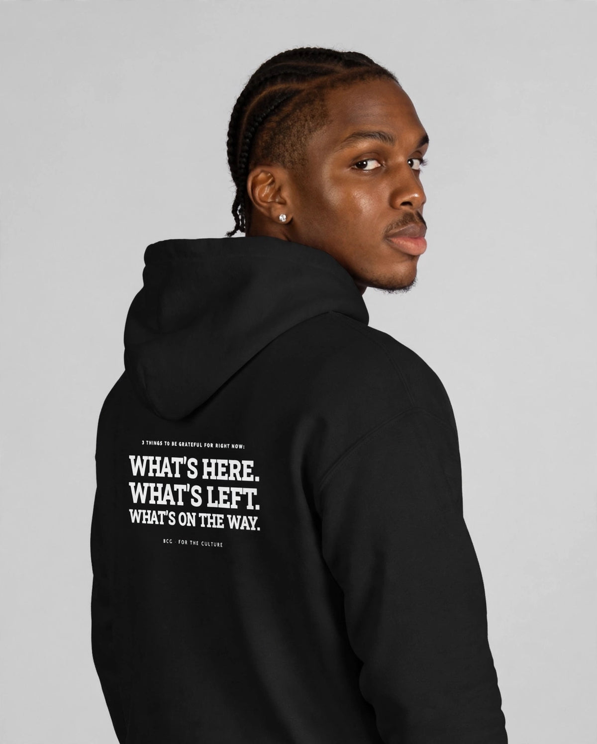 Patrick wearing the Grateful Hoodie – Roboto Slab (Black), back view