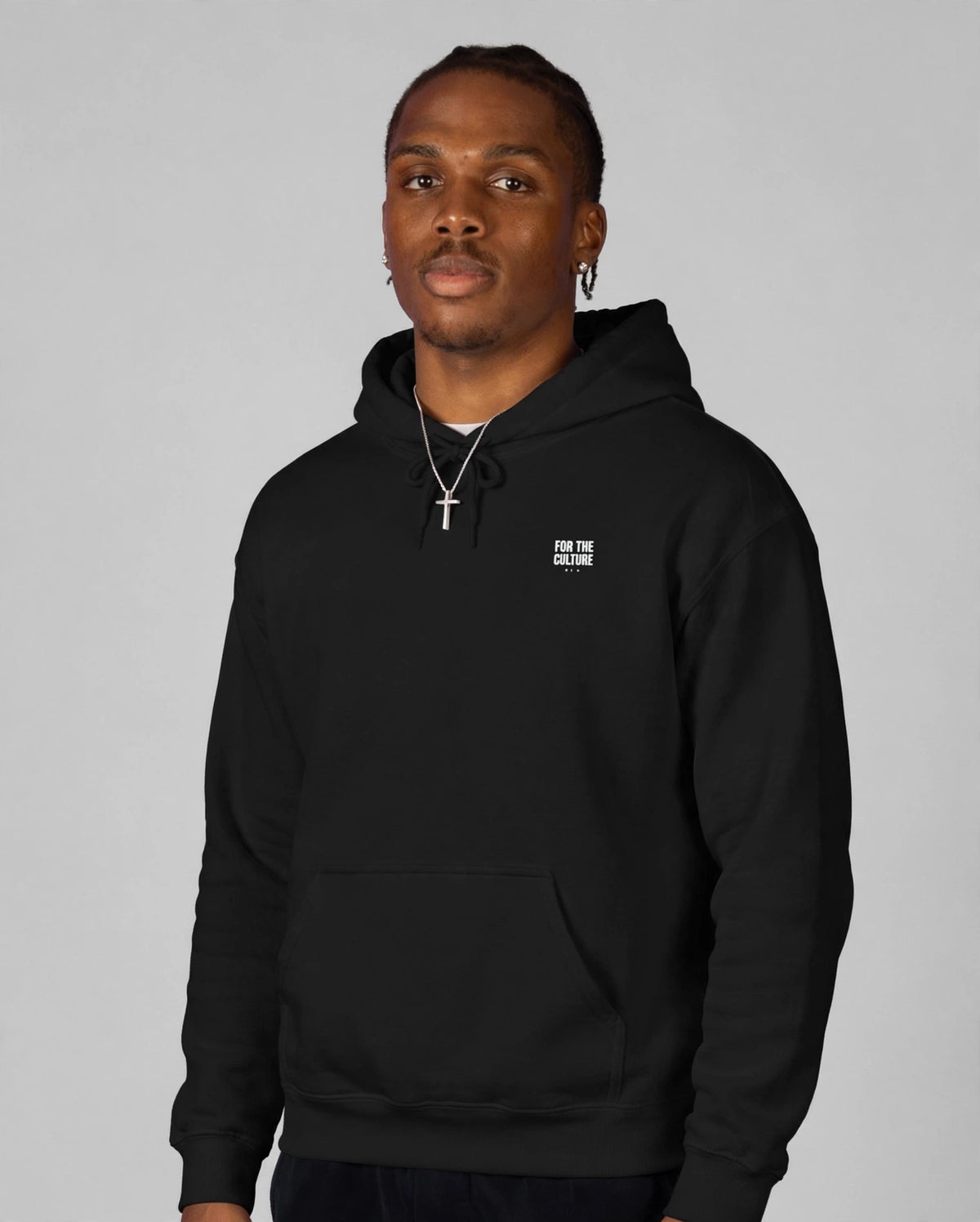 Patrick wearing the The Lesson Hoodie – Stencil (Black), front view