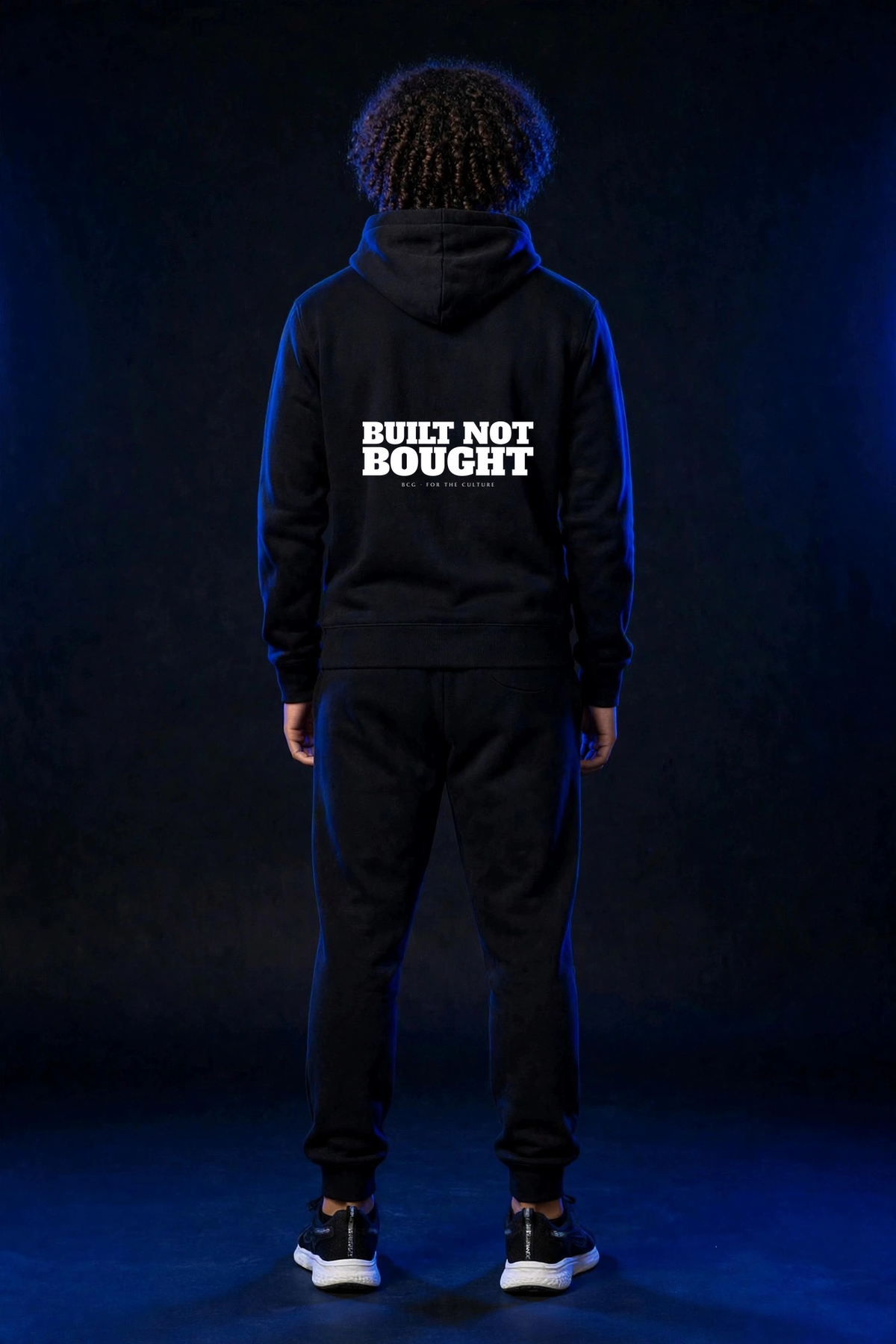 Michael wearing the Built Not Bought Hoodie – Alfa Slab (Black) (back)