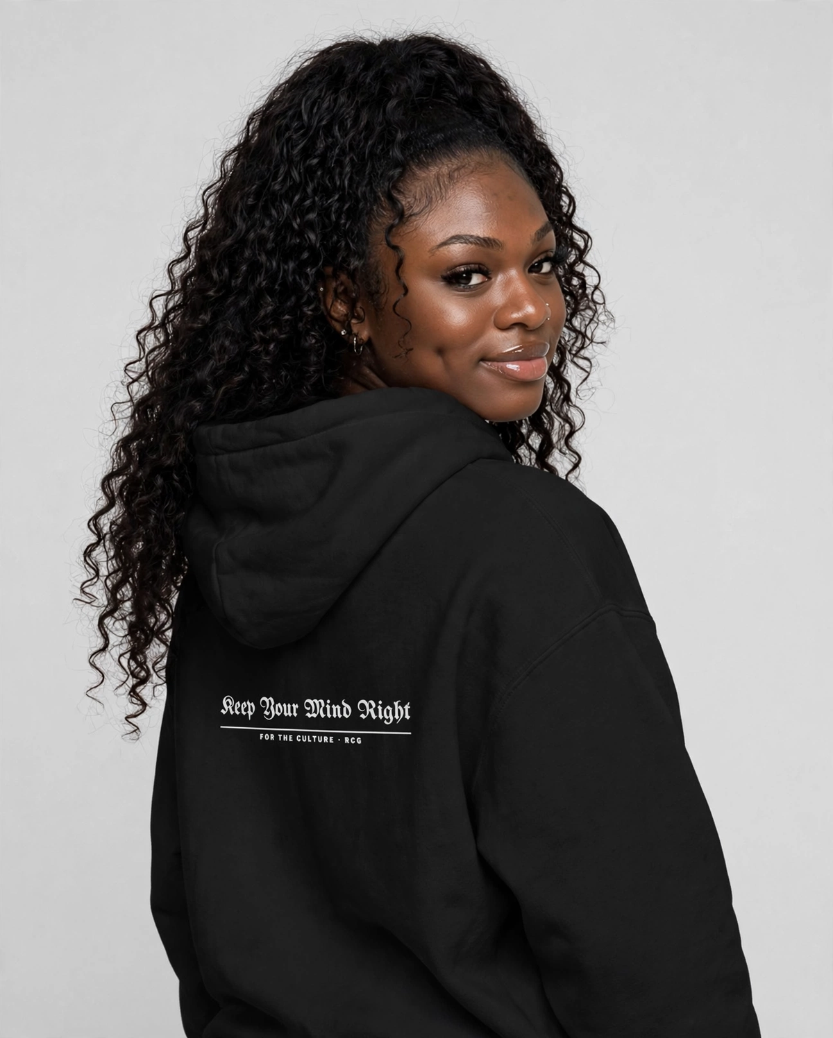 PA wearing the Keep Your Mind Right Hoodie – Blackletter (Black), back view