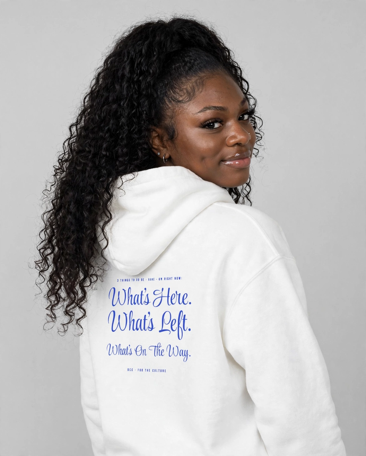 PA wearing the Grateful Hoodie – Style Script (White), back view
