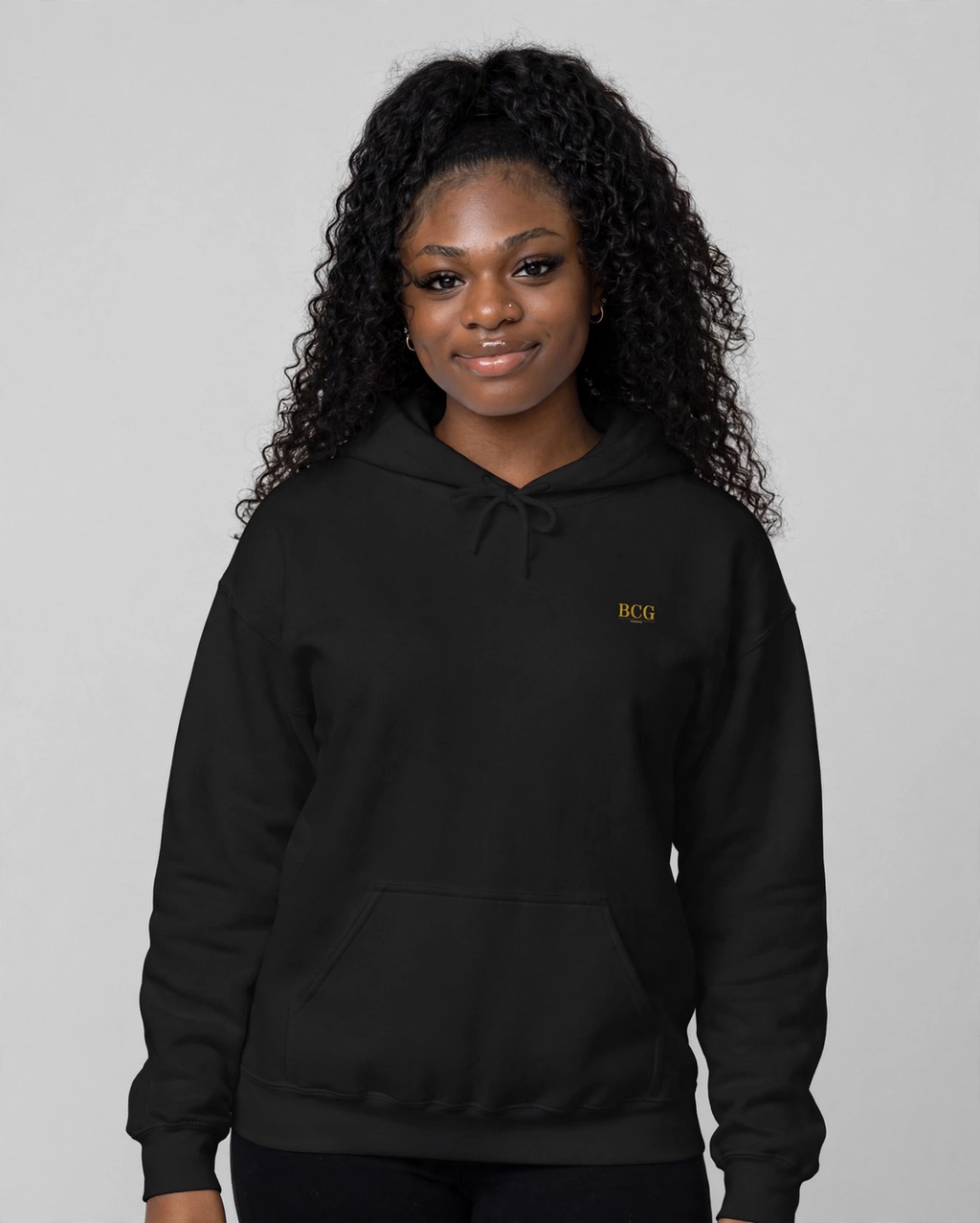 PA wearing the The Lesson Hoodie – Didot (Black), front view