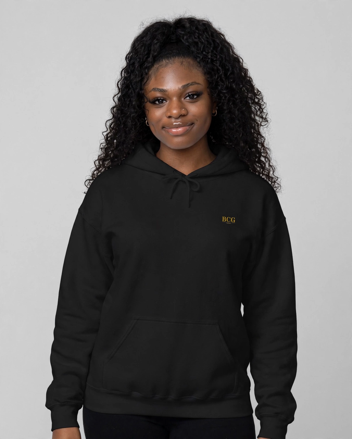 PA wearing the The Lesson Hoodie – Didot (Black), front view