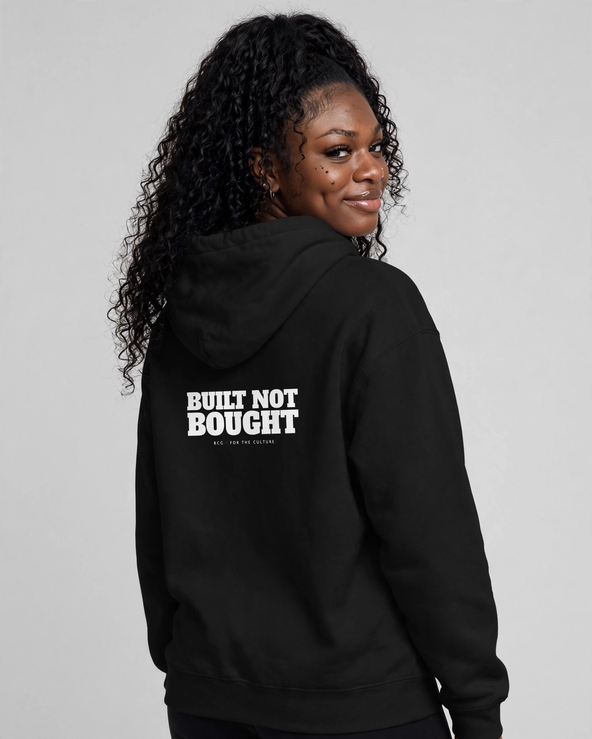 PA wearing the Built Not Bought Hoodie – Alfa Slab (Black), back view
