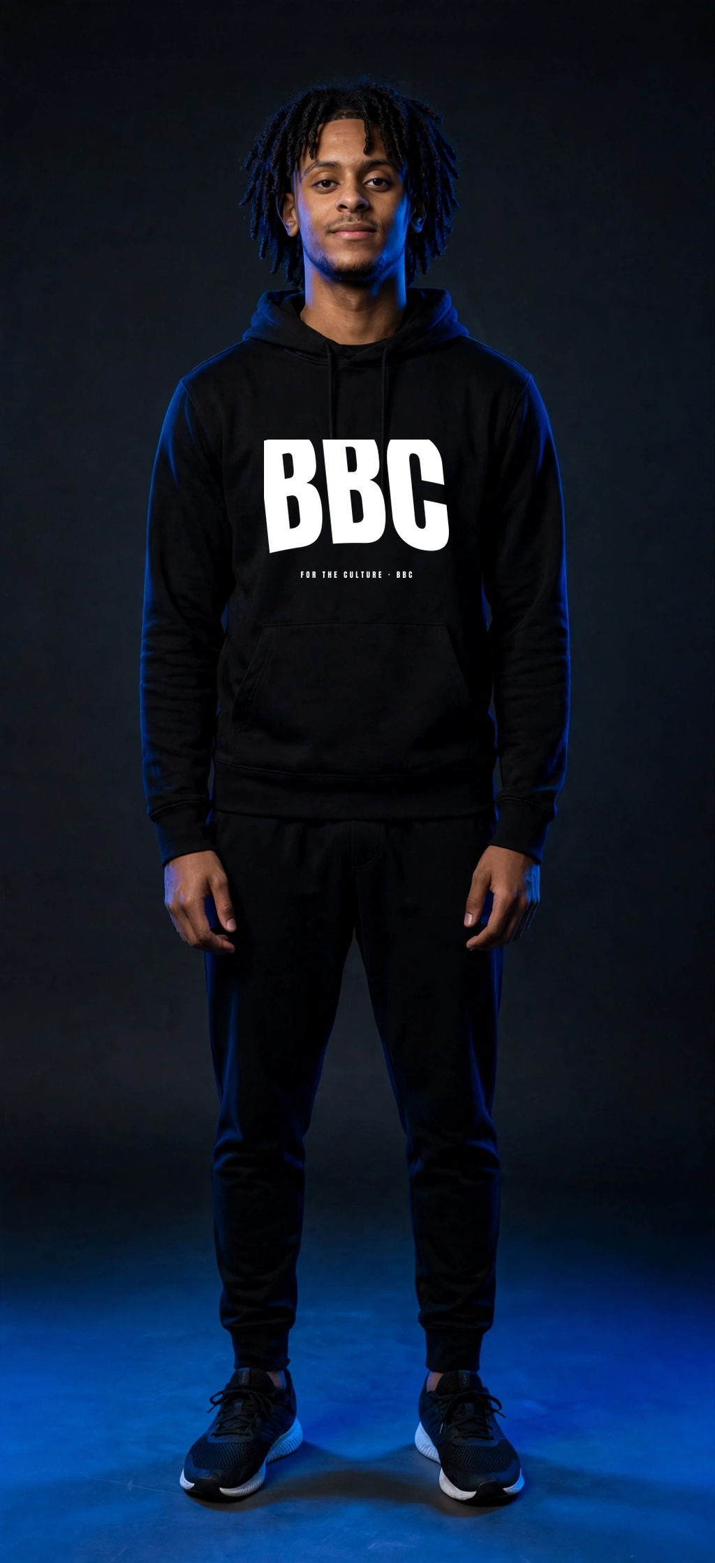 Sefi wearing the BBC Stadium Arch Hoodie – Black