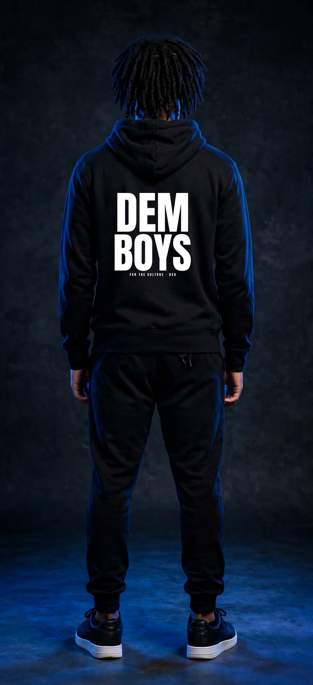 Sefi wearing the DEM BOYS Hoodie – BCG Left Chest (Black) (back)