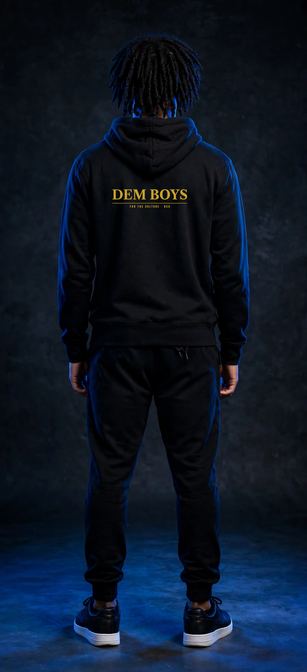 Sefi wearing the DEM BOYS Hoodie – Caslon (Black) (back)
