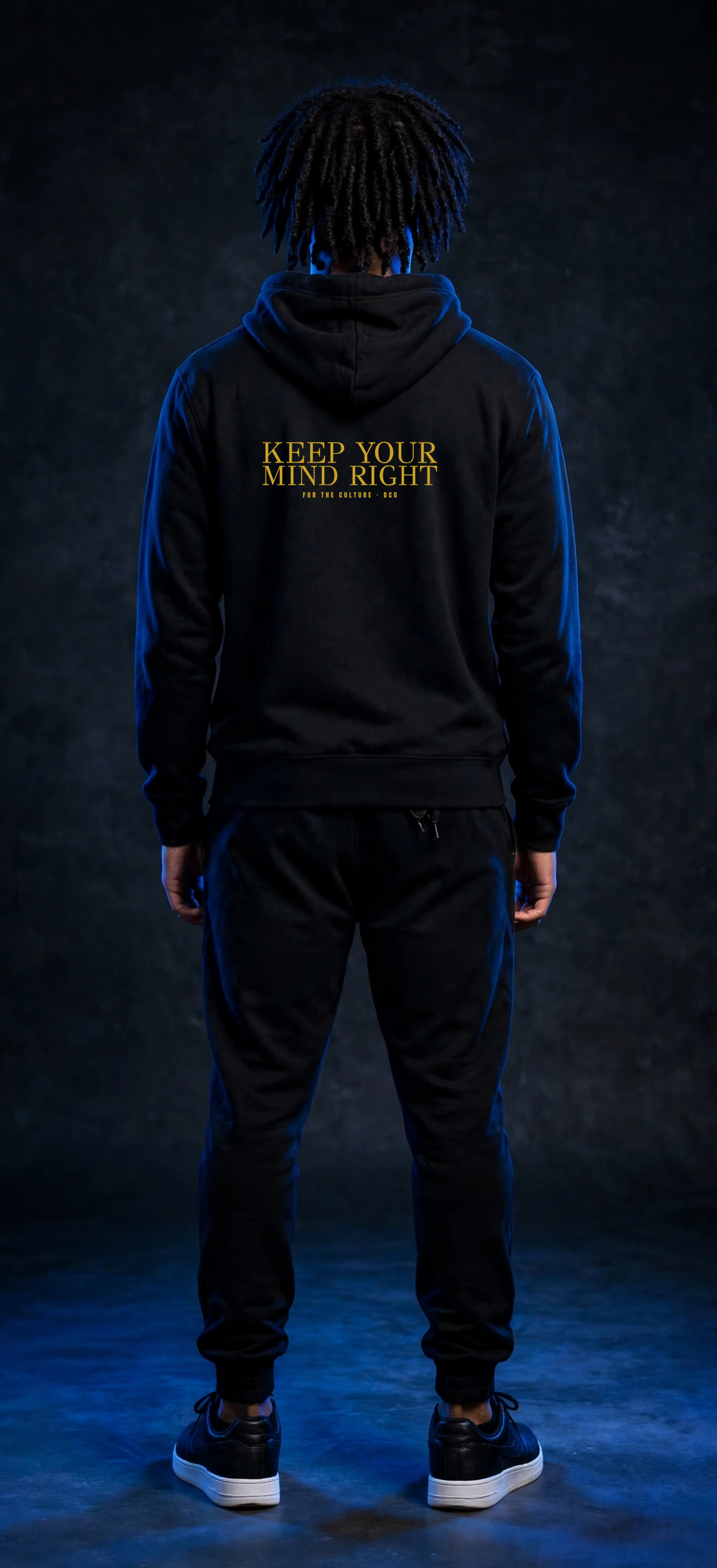 Sefi wearing the Keep Your Mind Right Hoodie – Didot (Black) (back)