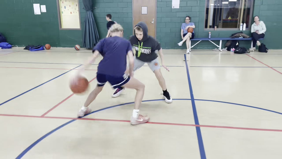 Handles vs a Live Defender — Ages 8–11